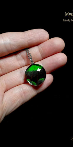 Iridescent green Papilio palinurus butterfly wing necklace, 20mm glass lens pendant, nature-inspired wholesale jewelry for eco boutiques and resellers