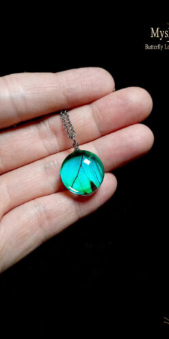 Iridescent Papilio lorquinianus butterfly wing necklace, 18mm glass lens pendant, handmade nature-inspired jewelry gift symbolizing hope and transformation