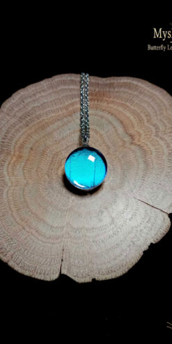 Rare Blue Morpho butterfly necklace (16mm) with authentic Morpho deidamia wing under glass, handmade nature jewelry pendant symbolizing transformation and peace