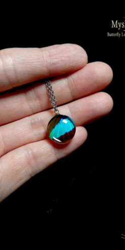 Handmade Doxocopa cherubina wing necklace with vibrant turquoise blue butterfly wing under glass, nature-inspired jewelry gift for collectors and women